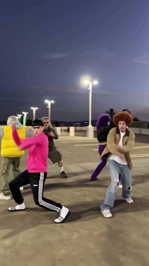 Mi Chico Trend - Pick five characters. They huddle over the phone, the leader takes the selfie, and all five dance the viral Mi Chico routine on the rooftop or a place you pick.