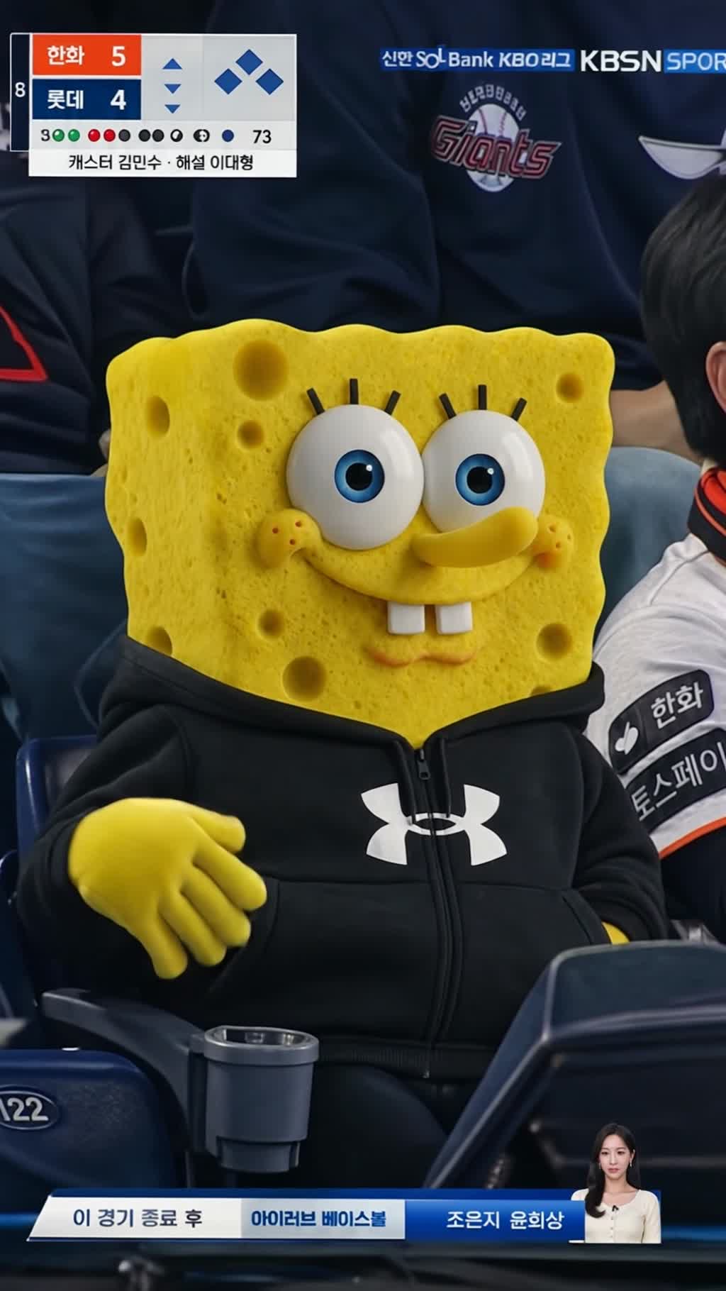 AI generated video: realistic sports broadcast video of character in a crowd, camera slowly zooms in as it is unaware of being on camera, it adjusts his hair or looks around casually watching the match, or sips a drink, but all in a natural casual way