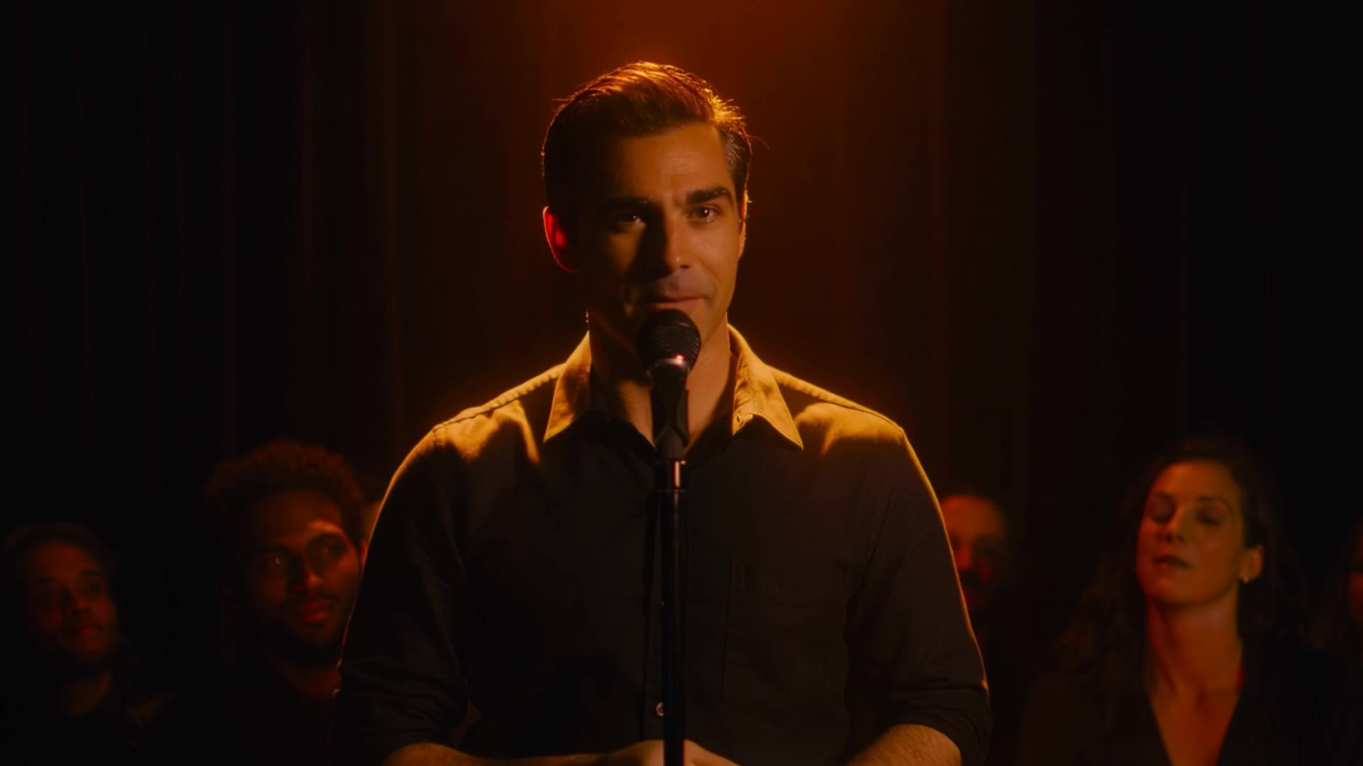 AI generated video: A warm spotlight isolates a lone comedian center-stage in a small comedy club; the camera holds a medium close-up with a gentle dolly in as he sways slightly with the mic, shallow depth of field softening the dark, shadowed audience behind him. His face is lit with amber key light and a subtle rim to separate him from the black curtains, beads of sweat and the texture of his shirt visible in crisp detail as he times the punchline; the room hums with scattered laughter and rising applause, a beer-glass clink and distant murmurs filling the tail of the joke as the camera lingers on his amused, defiant shrug and raised hands. 

Comedian: "My gym trainer said the first step is the hardest... Lies! The first step is easy. It's the 5,000th step that's trying to murder you!"