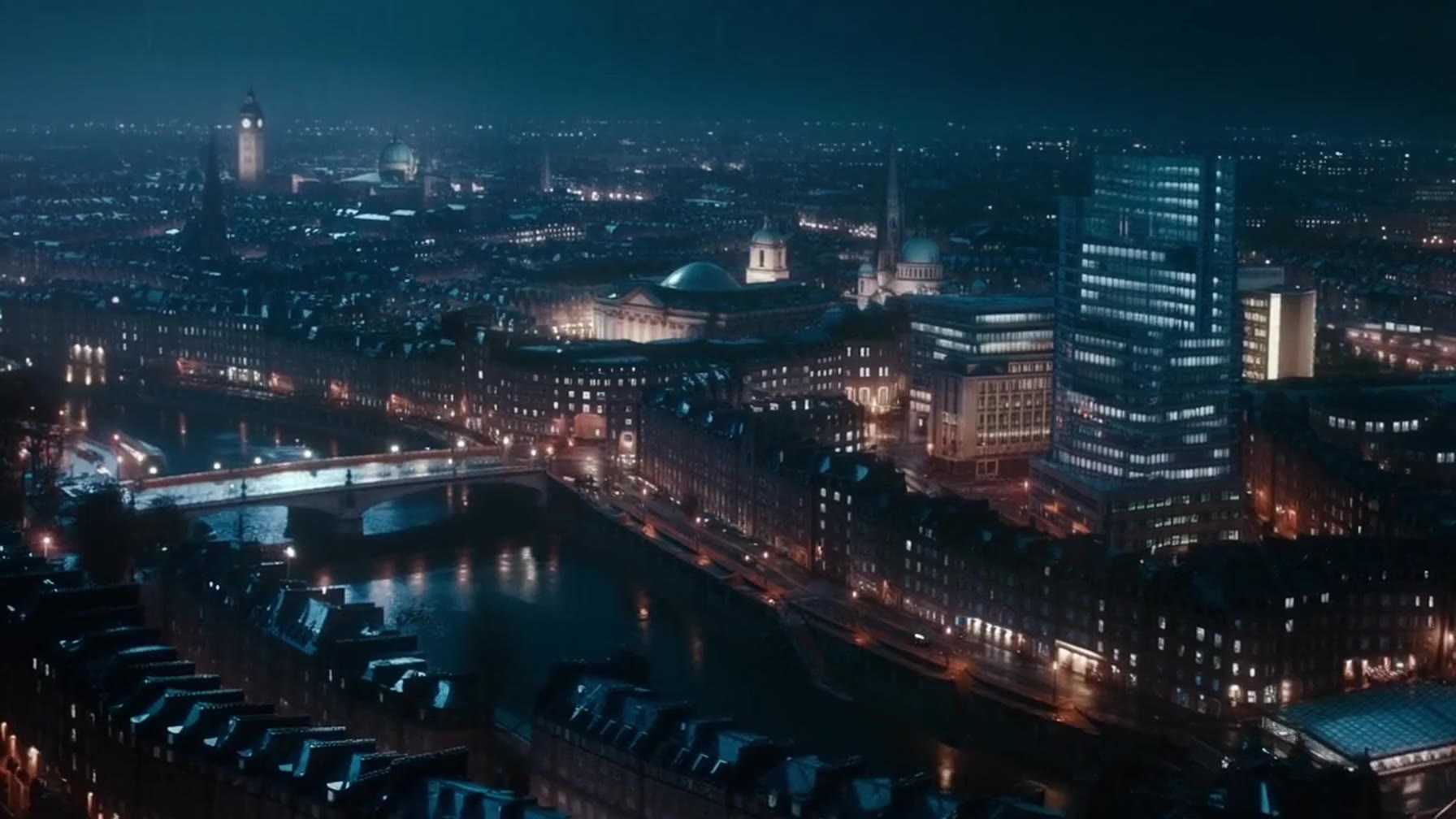 AI generated video: [00:00–00:02] City on the Brink
Camera: cinematic helicopter-style glide over a real-world European metropolis at night—think London–Reykjavík fusion—streetlights flickering as entire districts mysteriously lose power.
Action: key government buildings dim in sequence, like a deliberate code being executed.
Style: moody midnight blues; reflections on wet stone streets; light drizzle catching the lens.
Audio: SFX: distant sirens fading → a low analog hum failing.
Voice Over: “When nations tremble in silence…”

[00:02–00:04] Agent’s Ritual
Camera: intimate, classic spy close-up from a low angle.
Subject: the agent—impeccably sharp suit, subtle stubble, eyes calm—snaps open a leather case containing a sleek tactical respirator mask and a polished micro-comm earpiece.
Action: he adjusts his cufflink, revealing a hidden biometric trigger; the mask magnetically seals into place with a soft click.
Style: warm tungsten rim light; elegant shadows; understated sophistication.
Audio: soft mechanical lock → faint orchestral sting rising.

[00:04–00:06] The Adversary Revealed
Camera: long dolly into a fortified underground server vault.
Action: a silhouetted figure—an international mastermind—steps out, flanked by mercenaries in matte-black tactical gear. A compact EMP device pulses ominously in his hand.
Style: cold steel surfaces, red emergency lights sweeping rhythmically like old-school spy thrillers.
Audio: SFX: ticking circuitry + faint metallic echo.
Voice Over: “…only one man can stop the fall.”

[00:06–00:08] Classic Bond Chaos
Camera: fast Steadicam chase through a marble corridor → smash-cut to high-impact slow motion.
Action: agent slides across a polished floor, firing a silenced pistol; bullet ricochets off a mirror to disable a guard’s weapon. He then grapples another attacker using precise, efficient combat.
Style: elegant kinetic choreography; suits flaring; subtle sparks; practical realism.
Audio: crisp silenced shot + orchestral hit.
Voice Over (command): “Now, 6.”

[00:08–00:10] Signature Finale
Camera: rising crane shot behind the agent standing on the rooftop of an iconic building as the city lights surge back to life.
Action: a stylized agency crest appears as a massive holographic projection—sleek, modern, understated—its emblem shimmering like polished steel.
Style: classic Bond palette: gold accents, deep blacks, minimalist visual power.
On-screen text: “SPECTER PROTOCOL.”
Audio: bold brass flourish → final cinematic boom reminiscent of Bond’s signature stings.